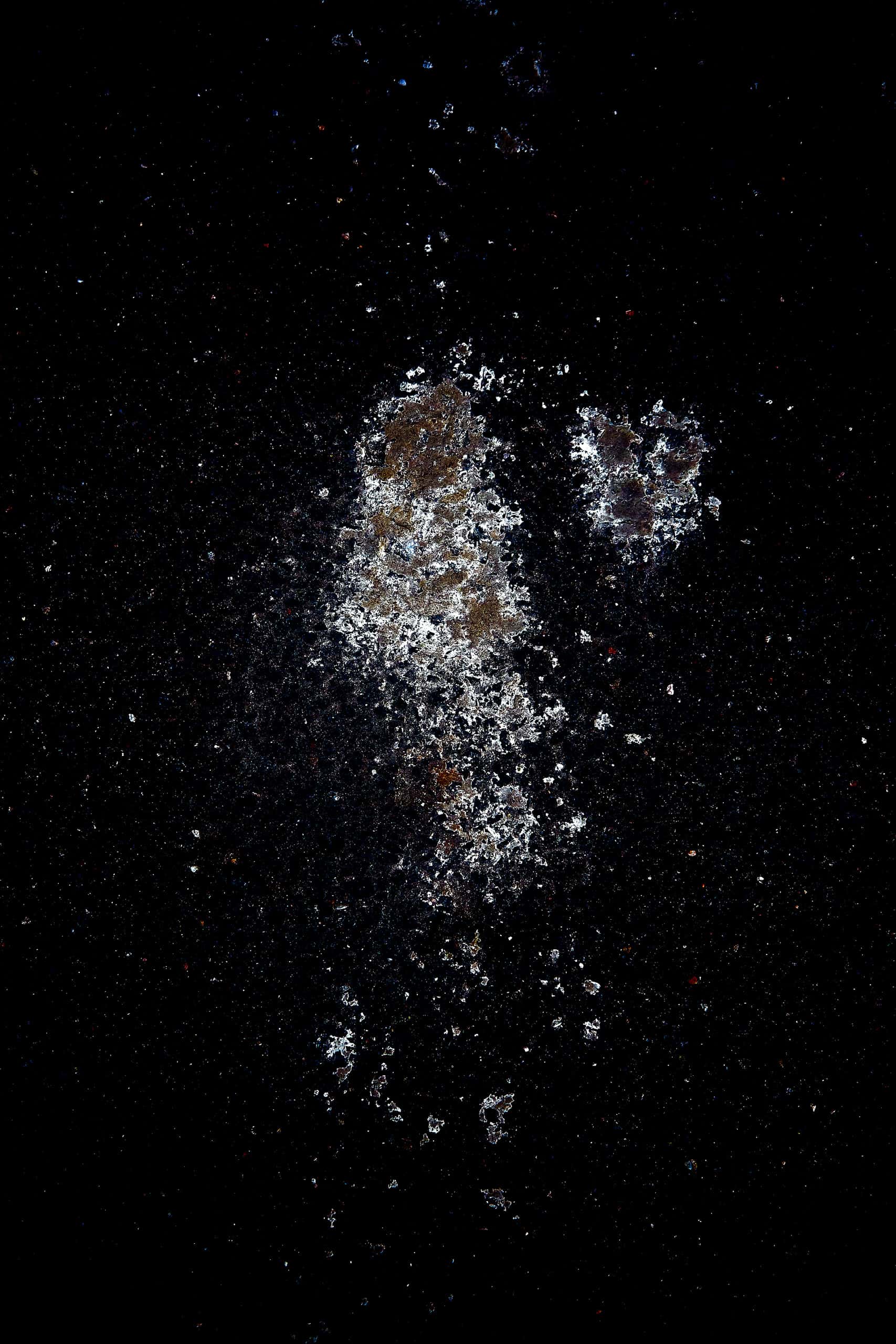 OpenCluster — A fragmented form floats in darkness, between matter and light. Particles trace decay as light and shadow evoke stillness, infinity, and…